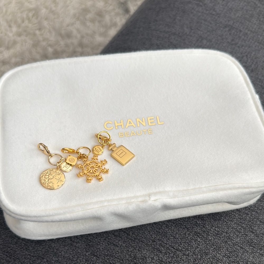 Chanel Beauté White Pouch with Gold Charms